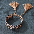 Pulsera bohemia con estampado de leopardo, cordones trenzados y borlas sobre piedra - Estilo Estampado Leopardo (SX530)