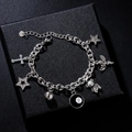 Bracciale retrò in acciaio inossidabile con stelle, croce e angelo su portagioie nero - Stile Argento a Ciondoli Multipli (Bracciale Orso)