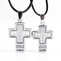 Detail of silver cross pendants with skull motifs, rhinestones and ONLY LOVE engraving - Silver