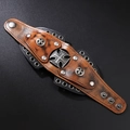 Vintage punk rock brown leather wristband featuring metal cross icons and stud details - Cross