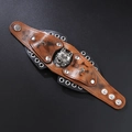 Vintage brown leather punk bracelet with silver wolf head carving and metal spikes - Wolf Head