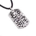 Vintage silver cross necklace with layered black mesh tag and woven cord on white background - Antique Bronze
