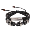 Bracciale multistrato in pelle nera intrecciata con tubi d'argento e cordino regolabile - Nero