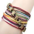 Kleurrijke geweven muzieknoot armbandenset met bronzen schildpadhangers om de pols - Schildpad Stijl (QNW2093)