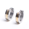Detail of two-tone stainless steel hoop earrings with gold inlay and silver polished edges - Gold