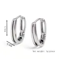Pair of minimalist silver oval hoop earrings with black vertical grooves, 1.5cm height - Silver