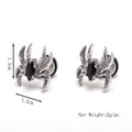 Pendientes de araña gótica plateada con piedra negra en una vista simétrica equilibrada - Araña / Plateado