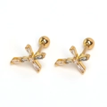 Detailed macro view of gold-plated cross stud earrings with sparkling cubic zirconia inlay - Gold