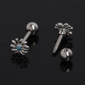 Macro detail of daisy flower screw back earrings with turquoise blue stone inlays - Blue Rhinestone