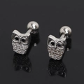 Detailed close-up of owl stud earrings with pavé white zircons and black gemstone eyes - White Rhinestone (Single)