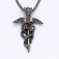 Collana con ciondolo caduceo gotico vintage con due serpenti e gemma rossa in argento - Argento