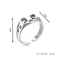 Retro punk style crying face ring in antique silver finish with adjustable open band - Silver