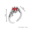 Retro silver crown ring featuring a red ruby gemstone and embossed frog detail - Silver