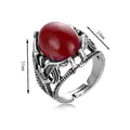 Bague vintage argentée ajourée avec grande pierre rouge ovale et anneau ajustable - Argenté