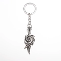 Vintage silver swirling flame metal pendant keychain with hollow design for bags - Silver