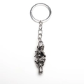 Detailed view of vintage silver skull pendant keychain with interlocking gothic design - Silver