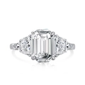 French S925 silver ring with emerald cut green zircon and side stones on white background - US 8 / White