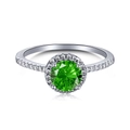 Classic round green cubic zirconia ring in silver with halo setting and micro-pave band - Round Green Gemstone Halo Style