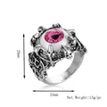 Gothic silver punk ring with a realistic pink evil eye and skull skeleton design - Silver