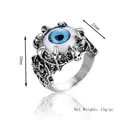 Vintage gothic evil eye ring with blue eyeball and skeleton details in antique silver finish - Silver