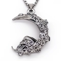 Gothic crescent moon necklace with skull pendant and crater texture in vintage silver finish - Silver