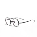 Montatura per occhiali rotonda minimalista in titanio nero con aste sottili stile vintage - Nero