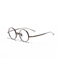Montatura occhiali rotonda vintage in puro titanio con finitura bronzo antico unisex - Marrone