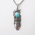 Collana con ciondolo a piuma d'argento vintage e intarsio in turchese ovale lucido - Argento