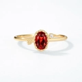 Macro detail of gold S925 silver ring featuring red garnet heart and Cupid's arrow design - HK11# / Champagne Gold