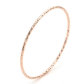 Minimalist 18K rose gold plated titanium steel bangle with textured geometric facets - Rose Gold
