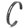 Close-up of matte black titanium C-shaped cuff bracelet featuring three inset crystals - Black