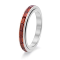 Close-up of titanium steel spinner ring featuring channel-set rectangular orange zircons - US 5 / Silver with Red Rhinestone