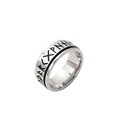 Macro detail of silver stainless steel ring featuring black engraved Viking runes - US 7 / Steel