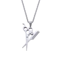Detailed close-up of a scissor and comb pendant necklace for hairstylists in silver steel - Silver Pendant Only