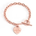 Elegante bracciale in acciaio al titanio oro rosa con cuore e chiusura a T - Oro rosa / 18cm