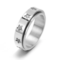 Polished stainless steel spinner ring with inlaid star patterns and zircon crystals - US 5 / Silver