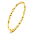 Bamboo-style stainless steel 18K gold plated bracelet for women on white background - Gold