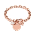 Bracciale in oro rosa con ciondoli a cuore, chiusura a T e pavé di zirconi bianchi - Oro rosa