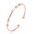 Minimalist rose gold titanium steel C-shaped cuff bracelet with sliding square metal beads - Rose Gold