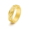 Detail view of 6mm golden fidget ring featuring embossed sun, moon and star patterns - US 5 / Gold