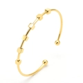 Minimalist gold titanium steel C-shaped open bracelet with small geometric cube beads - Gold