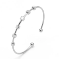 Detail of silver C-shape open bracelet with six movable geometric cube beads - Silver
