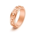 6mm rose gold celestial spinning ring with sun moon and star motifs on white background - US 5 / Rose Gold