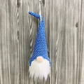 Dettaglio di gnomo nordico con cappello a maglia blu e bianco e lunga barba bianca - Gnomo Scandinavo - Paillette Blu