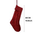 Classic red knitted Christmas stocking 48cm with cable stitch and hanging loop on white backdrop - Knitted Christmas Stocking - Red