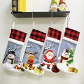Christmas stocking set with Santa, reindeer and snowman designs with plaid top trim - Set Of Four