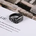 Retro stainless steel punk ring for men featuring vintage relief texture and flat surface - US 7 / Vintage Silver