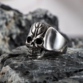 Punk style skull ring in vintage silver finish placed on a natural grey rock - US Size 7 / Silver D (Grooved Forehead Style)