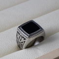 Macro shot of men's vintage steel ring with square black stone and floral carving - US Size 9 / Vintage Pattern Style (SA905)
