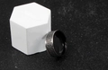 Detail shot of men's vintage Celtic knot ring with black matte inner coating and silver finish - US Size 8 / Black